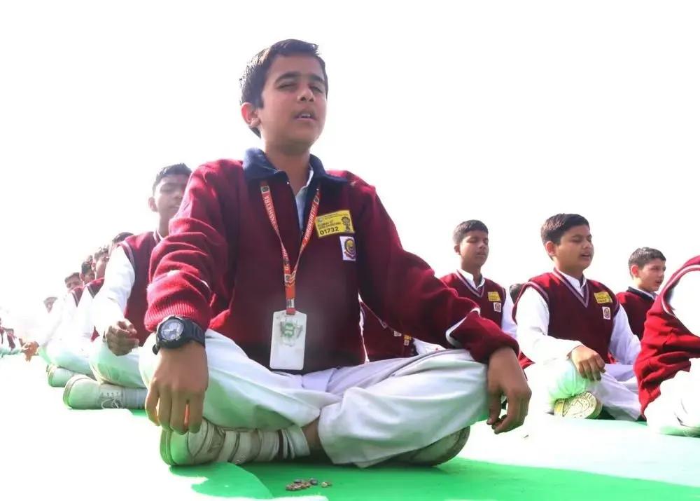 A student sitting in meditation